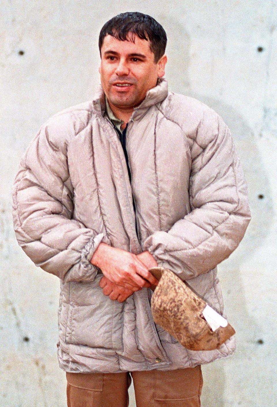 In this June 10, 1993 file photo, Mexican drug lord Joaquin "El Chapo" Guzman, is shown to the press after his arrest at the high security prison of Almoloya de Juarez, on the outskirts of Mexico City.