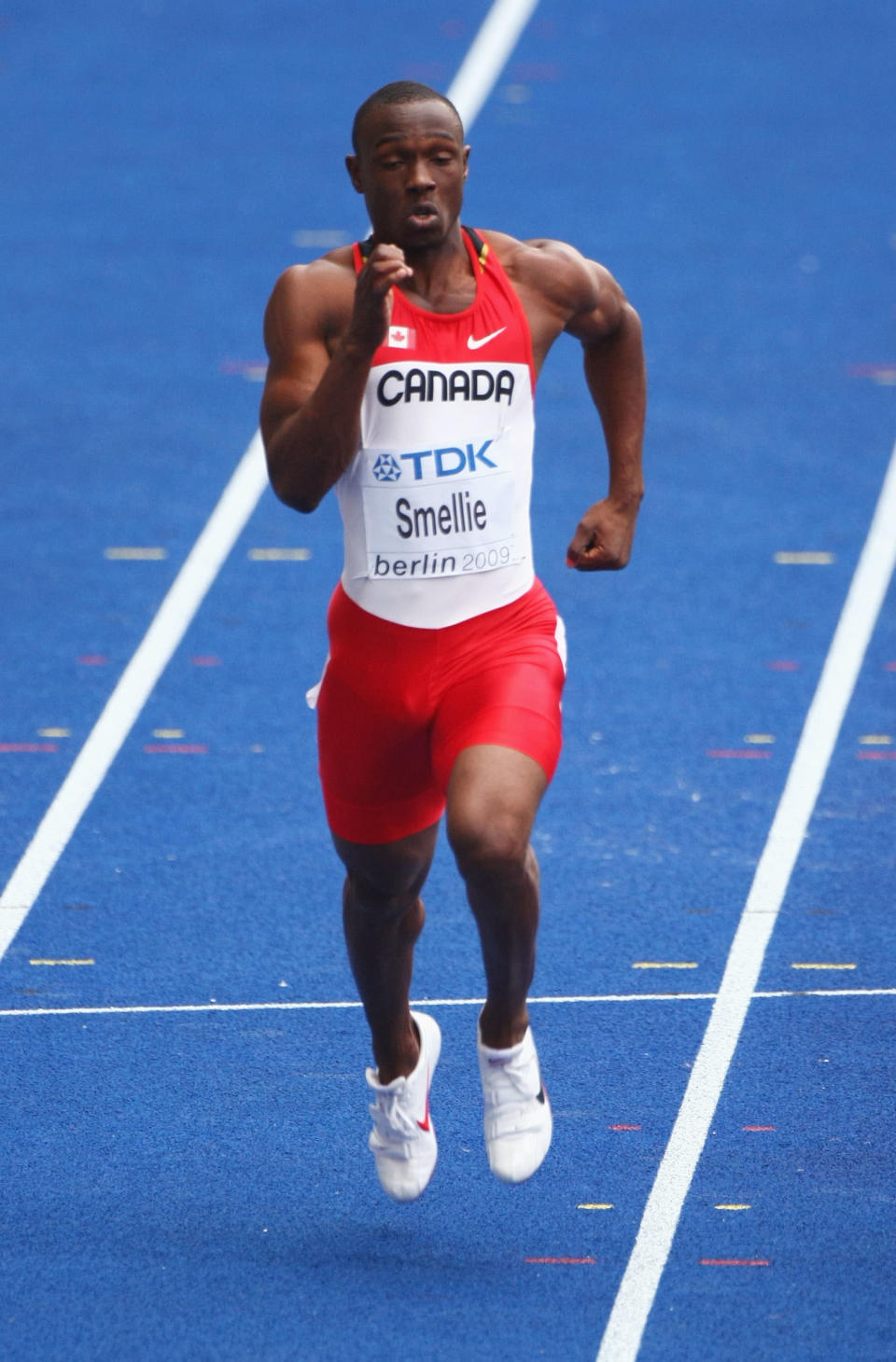 <b>Gavin Smellie - Canada - Track & Field </b> <br> Gavin Smellie of Canada competes in the men's 200 Metres Heats during day four of the 12th IAAF World Athletics Championships at the Olympic Stadium on August 18, 2009 in Berlin, Germany. (Photo by Alexander Hassenstein/Bongarts/Getty Images)