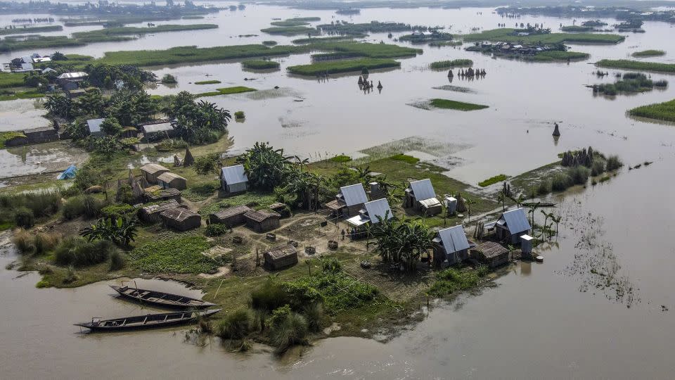 Houses surrounded by floodwaters in Char Shildaha, Bangladesh on September 3, 2023. The country is on the frontlines of the climate crisis. - Munir Uz Zaman/AFP/Getty Images