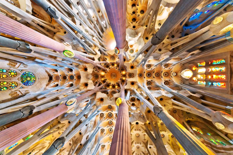 A view looking up toward the ceiling of Sagrada Familia.