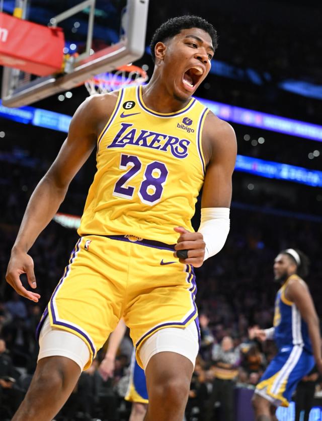Lakers forward Rui Hachimura celebrates a slam dunk against the Warriors in the fourth quarter.