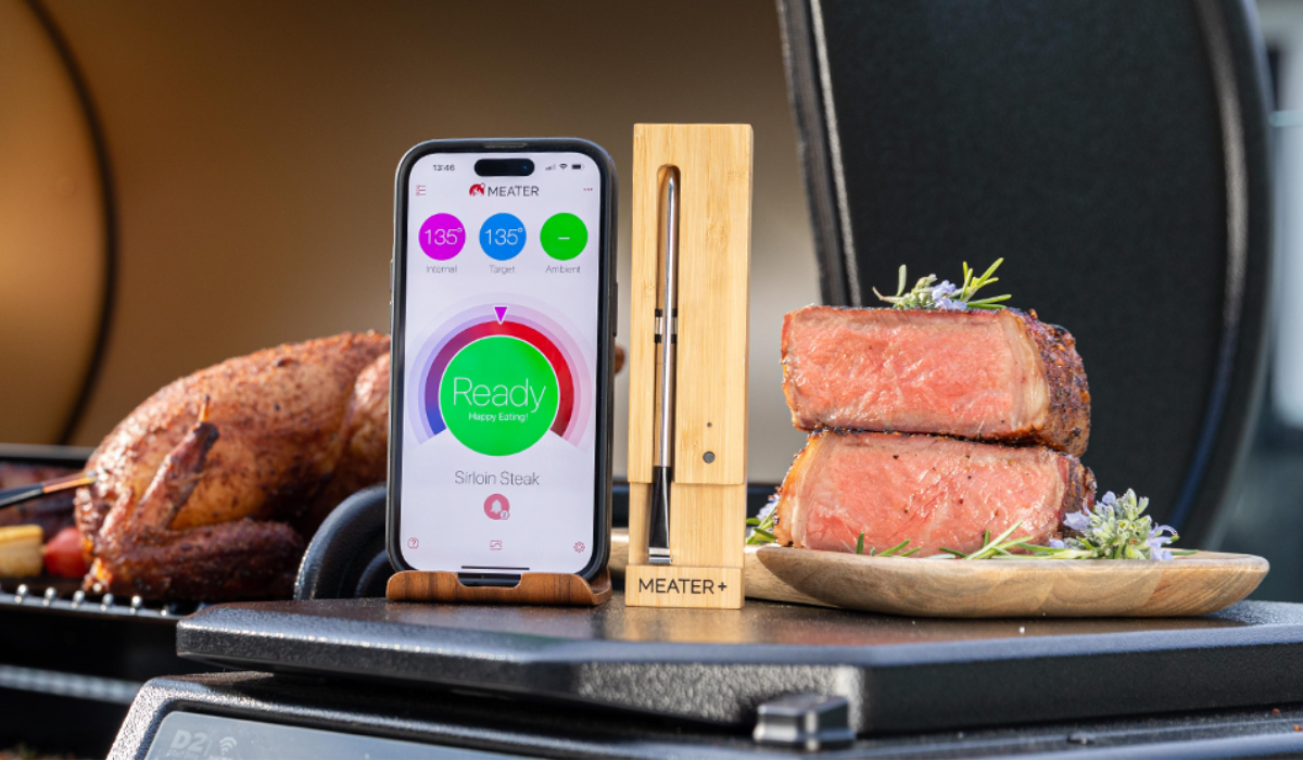 the meater meat thermometer next to a steak