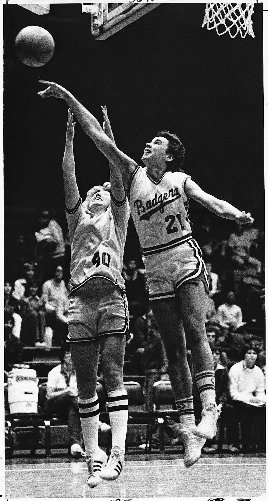 Theresa Huff  (21) blocks a shot during one of the 118 games she played for the University of Wisconsin from 1979-83.