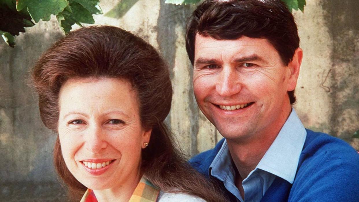 Princess Anne in a rainbow shirt with Timothy Laurence