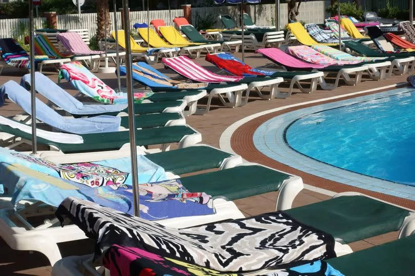 Spain pool and sunbeds