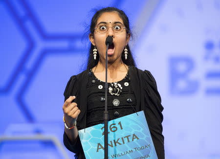 Ankita Vadiala of Manassas, Virginia, reacts to the word "ballabile", which she spelled correctly, during the semi-final round of the 88th annual Scripps National Spelling Bee at National Harbor, Maryland, May 28, 2015. REUTERS/Joshua Roberts
