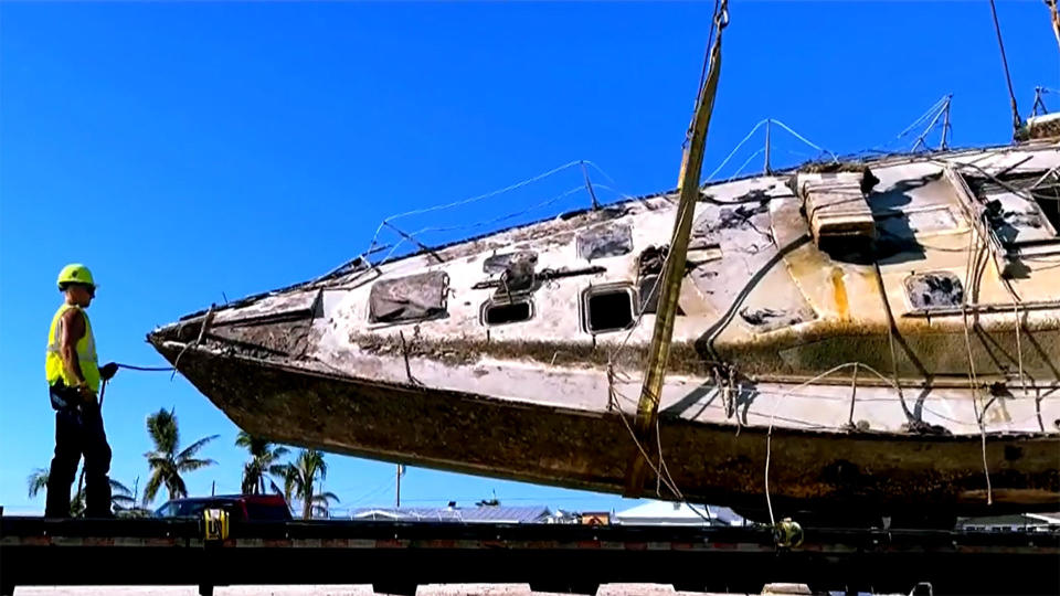 Transporting a sailboat via flatbed truck.  / Credit: CBS News