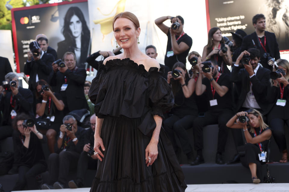 Jury president Julianne Moore poses for photographers upon arrival at the premiere of the film 'The Hanging Sun' during the 79th edition of the Venice Film Festival in Venice, Italy, Saturday, Sept. 10, 2022. (Photo by Joel C Ryan/Invision/AP)