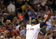 FILE - Boston Red Sox designated hitter David Ortiz reacts as he crosses home plate after hitting a two-run home run during the sixth inning of a baseball game against the Baltimore Orioles on June 24, 2015, at Fenway Park in Boston. Ortiz was elected to the National Baseball Hall of Fame on Tuesday, Jan 25, 2022. (AP Photo/Elise Amendola, File)