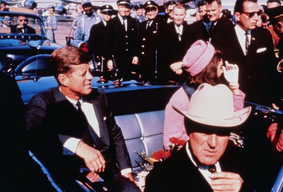 President John F. Kennedy and Jacqueline Kennedy ride in a motorcade shortly before the president was assassinated in 1963. <a href="https://media.gettyimages.com/id/515287546/photo/john-and-jackie-kennedy-with-john-connally-in-automobile.jpg?s=1024x1024&w=gi&k=20&c=3OafTV3DStR-cBpG-bnR1AXQFOy8WiYSwl7RXVmHTjg=" rel="nofollow noopener" target="_blank" data-ylk="slk:Bettmann/Contributor/Getty Images;elm:context_link;itc:0;sec:content-canvas" class="link ">Bettmann/Contributor/Getty Images</a>