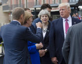 <p>From left, President of the European Council Donald Tusk gesticulates as he talks with German Chancellor Angela Merkel, French newly elected President Emmanuel Macron, partially hidden, British PM Theresa May, and US President Donald Trump before the start of the G-7 summit in the Sicilian town of Taormina, Italy, May 26, 2017. (Photo: Salvatore Cavalli/AP) </p>