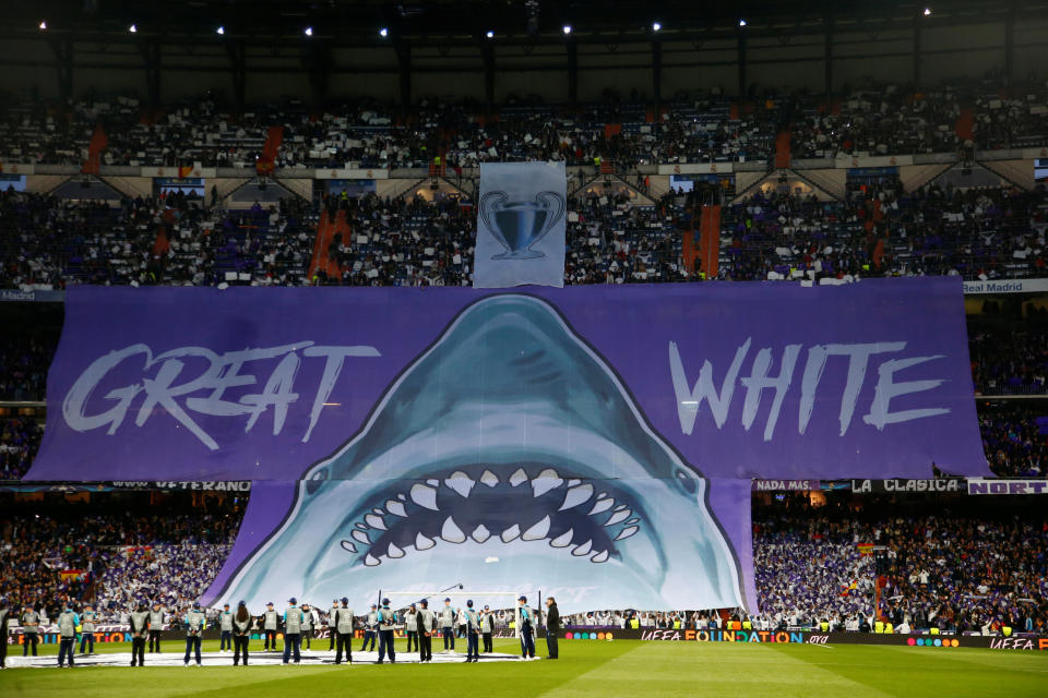 <p>Soccer Football – Champions League Quarter Final Second Leg – Real Madrid vs Juventus – Santiago Bernabeu, Madrid, Spain – April 11, 2018 Real Madrid fans display a banner before the match REUTERS/Stringer </p>