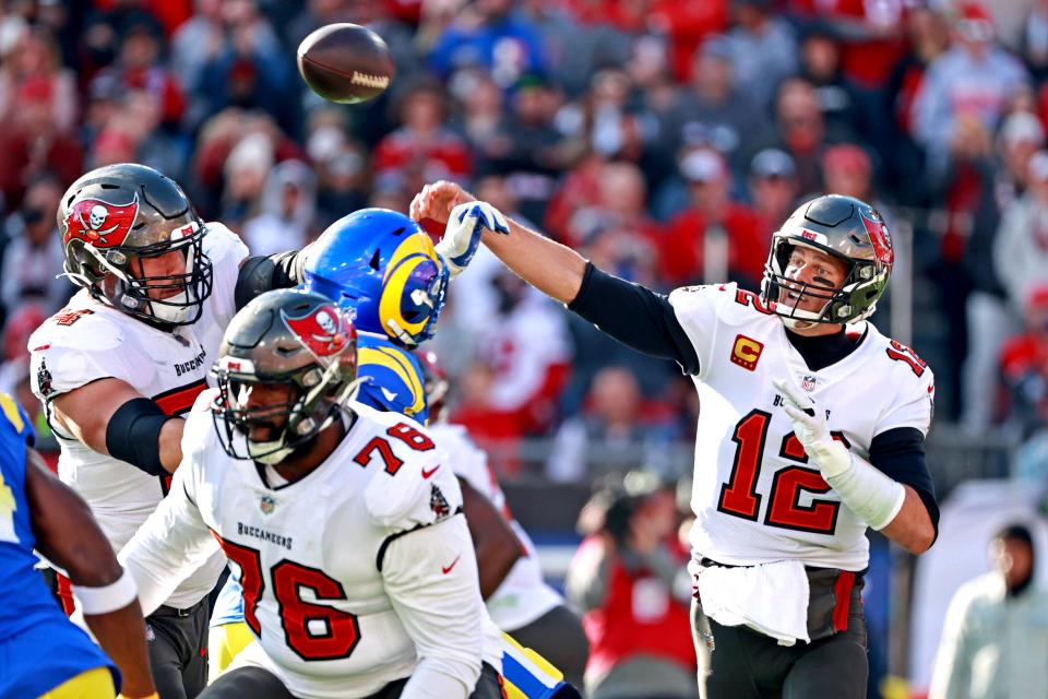 Buccaneers quarterback Tom Brady was under heavy pressure from the Rams defense throughout the first half of Sunday's NFC divisional playoff game.
