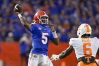 Florida quarterback Emory Jones (5) throws a pass over Tennessee linebacker Byron Young (6) during the first half of an NCAA college football game, Saturday, Sept. 25, 2021, in Gainesville, Fla. (AP Photo/John Raoux)