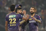 Kolkata Knight Riders' Varun Chakaravarthy, right, and team mates celebrate the wicket of Delhi Capitals' captain Rishabh Pant during the Indian Premier League cricket match between Delhi Capitals and Kolkata Knight Riders in Kolkata, India, Monday, April 29, 2024. (AP Photo/Bikas Das)