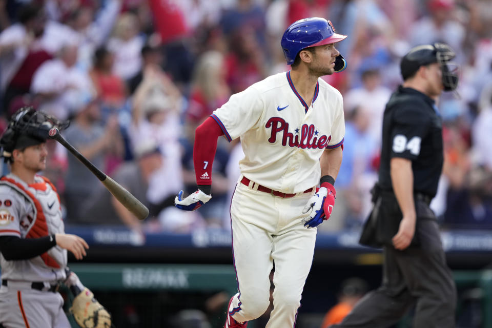 Philadelphia Phillies' Trea Turner watches after hitting a home tun against San Francisco Giants pitcher Alex Cobb during the sixth inning of a baseball game, Wednesday, Aug. 23, 2023, in Philadelphia. (AP Photo/Matt Slocum)