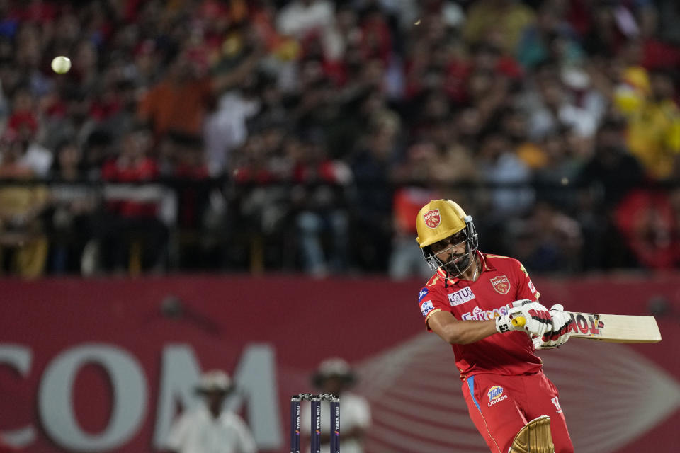 Punjab Kings' Atharva Taide bends to avoid a rising delivery during the Indian Premier League cricket match between Punjab Kings and Delhi Capitals in Dharamshala, India, Wednesday, May 17, 2023. (AP Photo/Ashwini Bhatia)