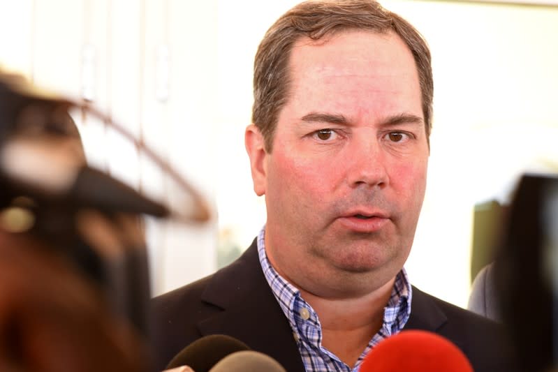 Benoit Desormeaux, CEO of the Canadian gold miner Semafo, speaks to the journalists as he visits the injured victims of the attack on a road leading to the Boungou, at the Blaise Compaore Hospital in Ouagadougou