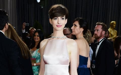 Anne Hathaway attends the 2013 Academy Awards - Credit: Rex/Frazer Harrison