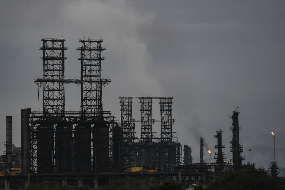 FILE - View of the Jose Antonio Anzoategui oil complex in Barcelona, Anzoategui State, Venezuela, July 3, 2022. The Biden administration on Saturday, Nov. 26, 2022, eased some oil sanctions on Venezuela in an effort to support newly restarted negotiations between President Nicolás Maduro’s government and its opposition. (AP Photo/Matias Delacroix, File)