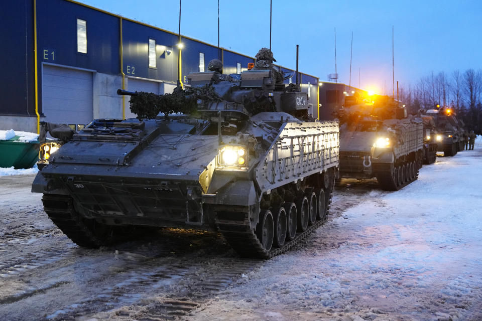 Britain's armoured vehicles prepare to move at the Tapa Military Camp, in Estonia, Thursday, Jan. 19, 2023. Britain's Defense Secretary Ben Wallace said his country would send at least three batteries of AS-90 artillery, armored vehicles, thousands of rounds of ammunition and 600 Brimstone missiles, as well as the squadron of Challenger 2 tanks. (AP Photo/Pavel Golovkin)