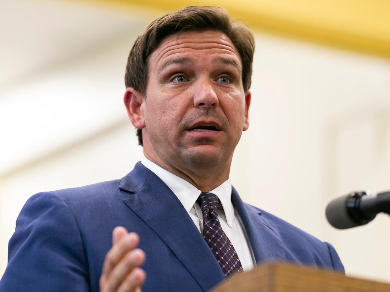 Florida Governor Ron DeSantis speaks during a news conference at West Miami Middle School in Miami (AP)