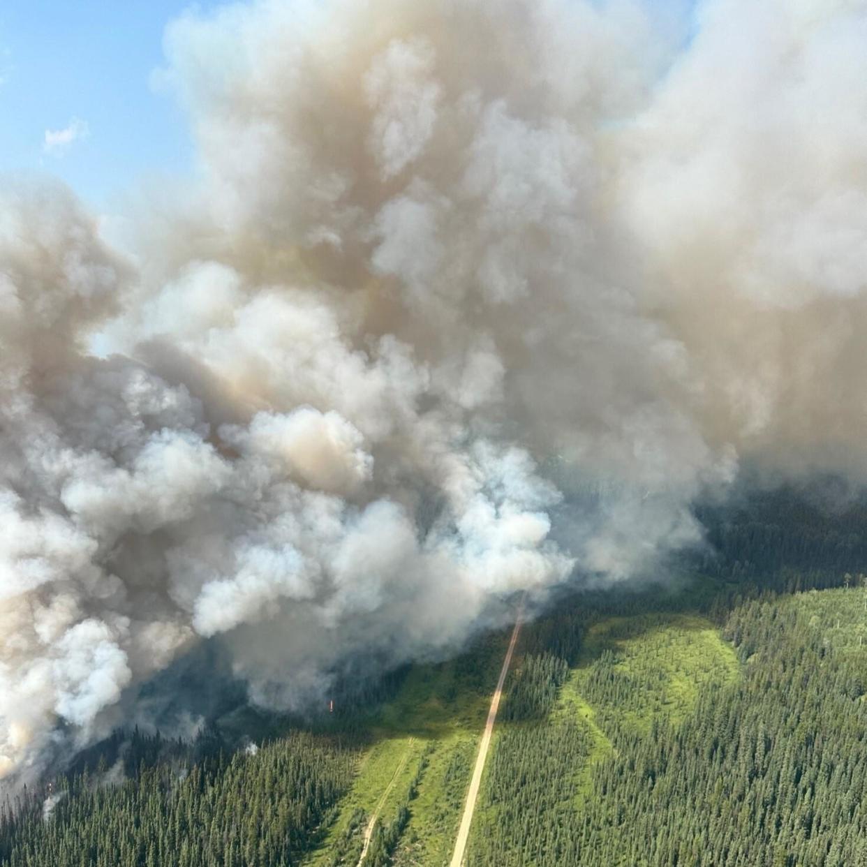 An aerial photo shows wildfire smoke rising over Jasper National Park, Alberta, Canada on July 24, 2024. / Credit: ALBERTA WILDFIRE/HANDOUT/Anadolu via Getty Images