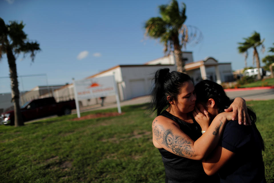 <span class="s1">Isabela, an asylum seeker from El Salvador, hugs her 17-year-old daughter, Dayana, on July 11 outside the federally contracted shelter Casa Esperanza in Brownsville, Texas. They had been separated earlier at the U.S.-Mexico border. (Photo: Carlos Barri/Reuters)</span>