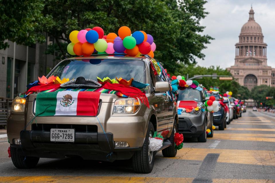 Members of "Mexicanas en Austin" celebrate Hispanic Heritage Month in 2020 with a car parade in downtown Austin.