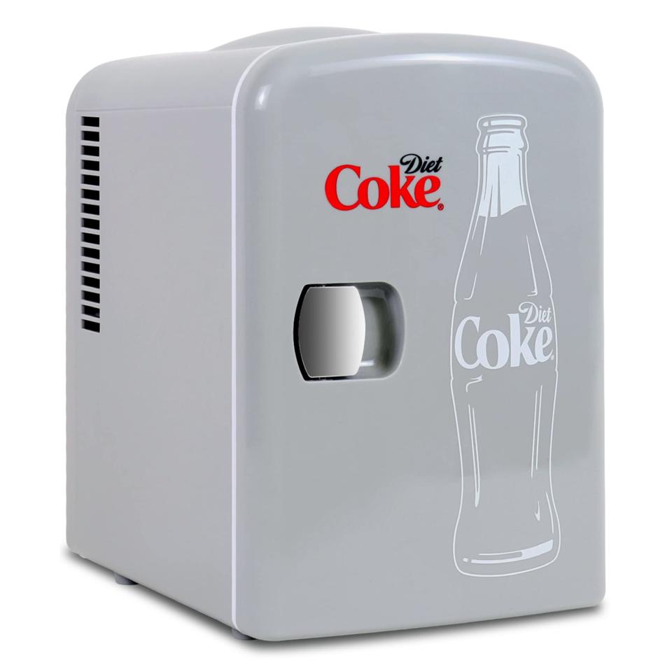 <p><a href="https://go.redirectingat.com?id=74968X1596630&url=https%3A%2F%2Fwww.walmart.com%2Fip%2FDiet-Coke-6-Can-Mini-Fridge-Portable-4L-Mini-Cooler-Travel-Compact-Refrigerator%2F856184661&sref=https%3A%2F%2Fwww.bestproducts.com%2Flifestyle%2Fg46503809%2Funique-gift-ideas%2F" rel="nofollow noopener" target="_blank" data-ylk="slk:Shop Now;elm:context_link;itc:0;sec:content-canvas" class="link ">Shop Now</a></p><p>Diet Coke Mini Fridge</p><p>walmart.com</p><p>$28.00</p>