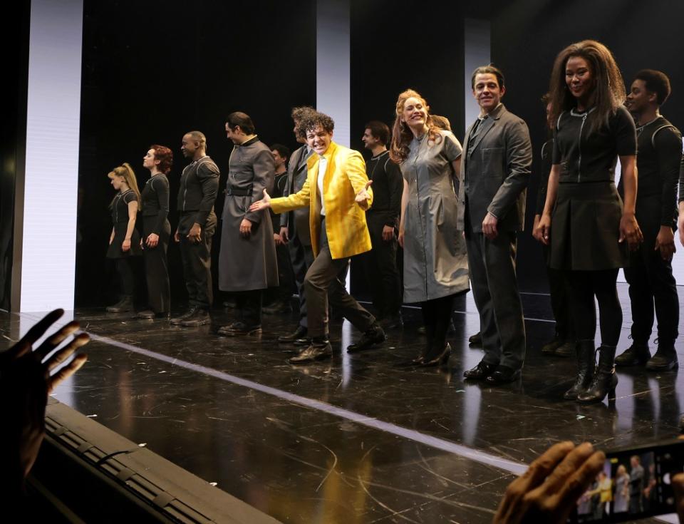 Overcome audiences leap to their feet and sway while the cast of “Tommy” sings “Listening To You.” Getty Images