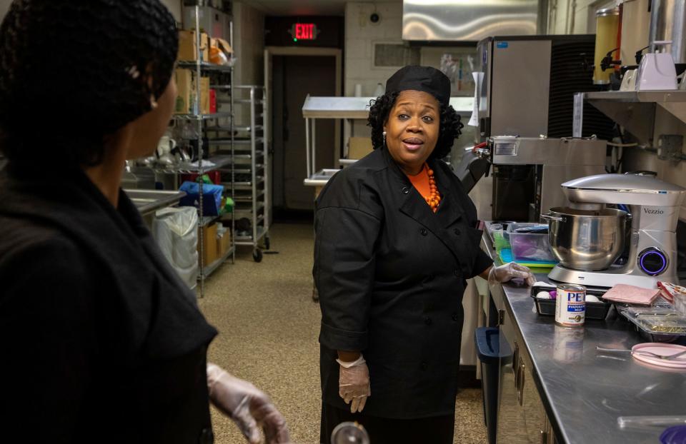 Linda Smith-Cummings, the owner of Soul Amazing LLC, stands inside the North Rosedale Park Community House kitchen in Detroit on Wednesday, Nov. 16, 2022. 