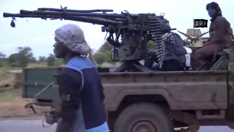 A screengrab taken on August 24, 2014 from a video released by the Nigerian Islamist extremist group Boko Haram shows alleged group members at an undisclosed location