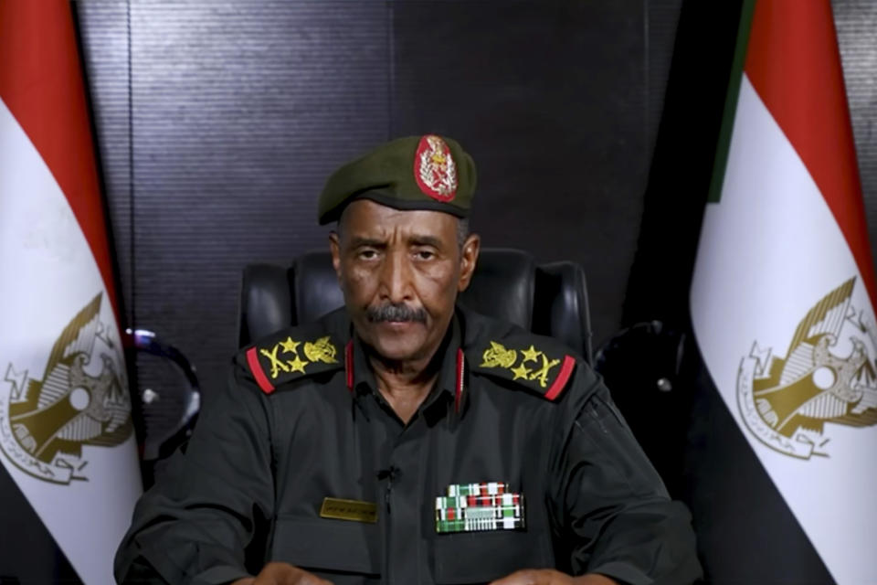 In this image made from video provided Friday, April 21, 2023, by the Sudan Armed Forces, Gen. Abdel-Fattah Burhan, commander of the Sudanese Armed Forces, speaks at an undisclosed location. Sudan's top general said Friday the military is committed to a transition to civilian rule, in his first speech since brutal fighting between his forces and the country's powerful paramilitary began nearly a week ago. (Sudan Armed Forces via AP)