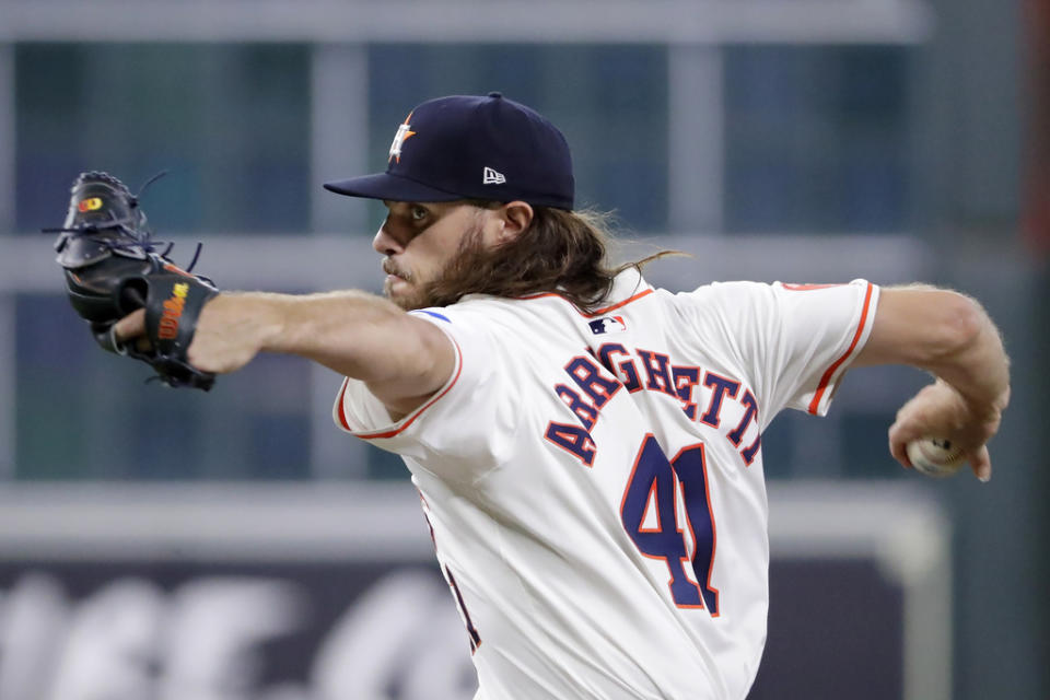 Houston Astros starting pitcher <a class="link " href="https://sports.yahoo.com/mlb/players/60188/" data-i13n="sec:content-canvas;subsec:anchor_text;elm:context_link" data-ylk="slk:Spencer Arrighetti;sec:content-canvas;subsec:anchor_text;elm:context_link;itc:0">Spencer Arrighetti</a> throws against the Cleveland Guardians during the first inning of a baseball game Thursday, May 2, 2024, in Houston. (AP Photo/Michael Wyke)