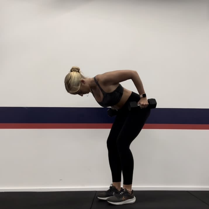 Personal trainer Klaudia Lucia demonstrating a bent-over row