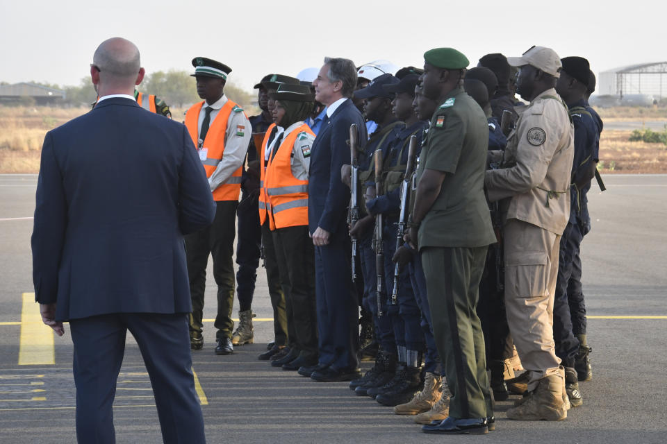 US Secretary of State Antony Blinken poses for a photograph with members of the Niger Defence and Security Forces, prior to departing the country, at the Diori Hamani International Airport in Niamey, Niger, Friday, March 17, 2023. (Boureima Hama/Pool Photo via AP)