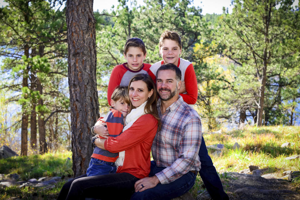In this photo provided by Robin Jackson taken on Oct. 21, 2017 in Boulder, Colo., is Meghan and Vaughn Bigelow, Sr. and their three sons (from left to right) Asa, Cooper and Vaughn, Jr. Vaughn Jr. was shot and killed after a road rage fight between his mother and Jeremy Webster in 2018. Webster is also accused of wounding Meghan and Asa Bigelow as well as a man who witnessed the shootings. Closing arguments in Webster's trial were expected Wednesday, April 26, 2023. (Robin Jackson via AP)
