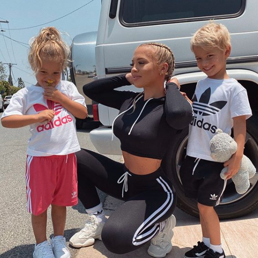 Tammy Hembrow with her daughter Saskia and son Wolf in a car park