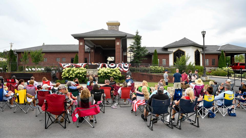 The crowd waits for a public memorial service for Charlie Daniels to start outside of Sellars Funeral Home in Mt. Juliet, Tenn., Wednesday, July 8, 2020.