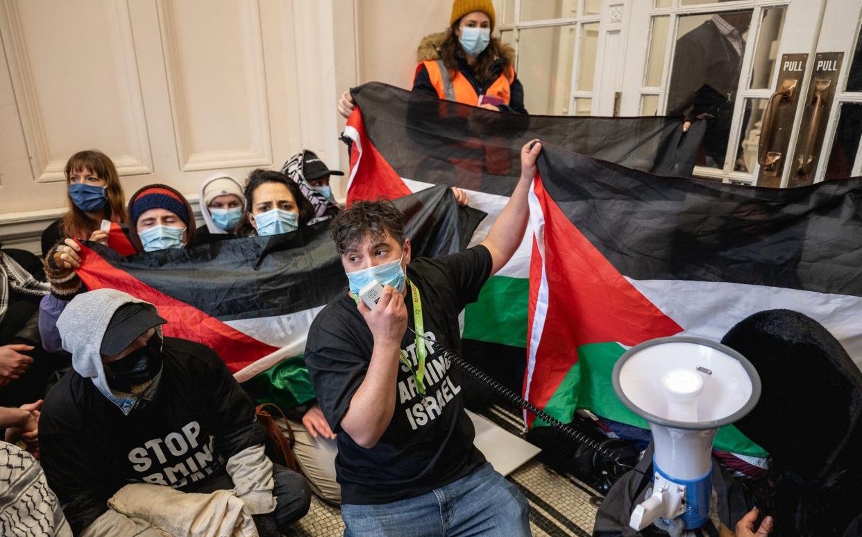 Supporters of London for a Free Palestine occupy the foyer of the Department of Business and Trade