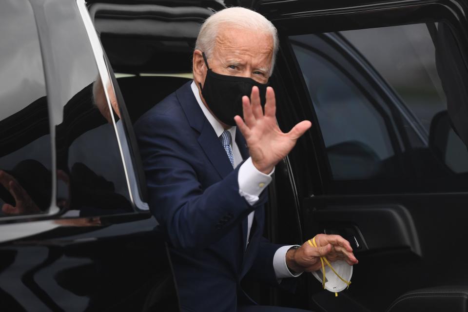 Democratic presidential nominee former US Vice President Joe Biden arrives to board an airplane at New Castle Airport in New Castle, Delaware, August 31, 2020, as he travels to Pennsylvania for campaign events. - Democratic White House hopeful Joe Biden on Monday castigated President Donald Trump as a "weak" and morally deficient leader who has sown chaos and fomented the violence that has recently gripped US cities. (Photo by SAUL LOEB / AFP) (Photo by SAUL LOEB/AFP via Getty Images)