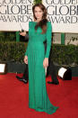 It was the hue du'jour at the 2011 Golden Globes - from jade to emerald, celebs shone like royalty in this unusual colour choice, and Angelina was no exception: the actress hit the red carpet in a shimmering long sleeved Versace dress, which she accessorised with Brad Pitt.