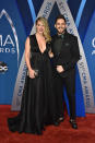 <p>The couple looked sharp in all black. (Photo: Getty Images) </p>