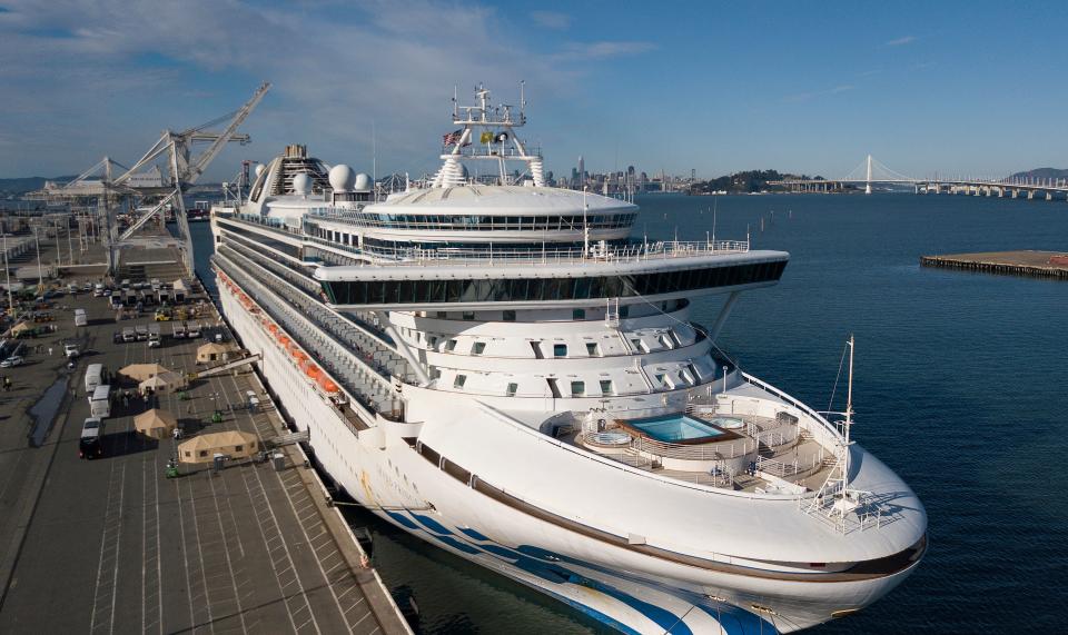 Passengers disembarked from the Grand Princess cruise ship at the Port of Oakland March 10, then boarded buses to head to quarantine.In the wake of coronavirus, many cruise lines are offering relaxed cancellation policies. (Photo: JOSH EDELSON/AFP via Getty Images)