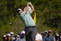 Jon Rahm, of Spain, tees off on the fifth hole during the final round at the Masters golf tournament on Sunday, April 10, 2022, in Augusta, Ga. (AP Photo/Jae C. Hong)