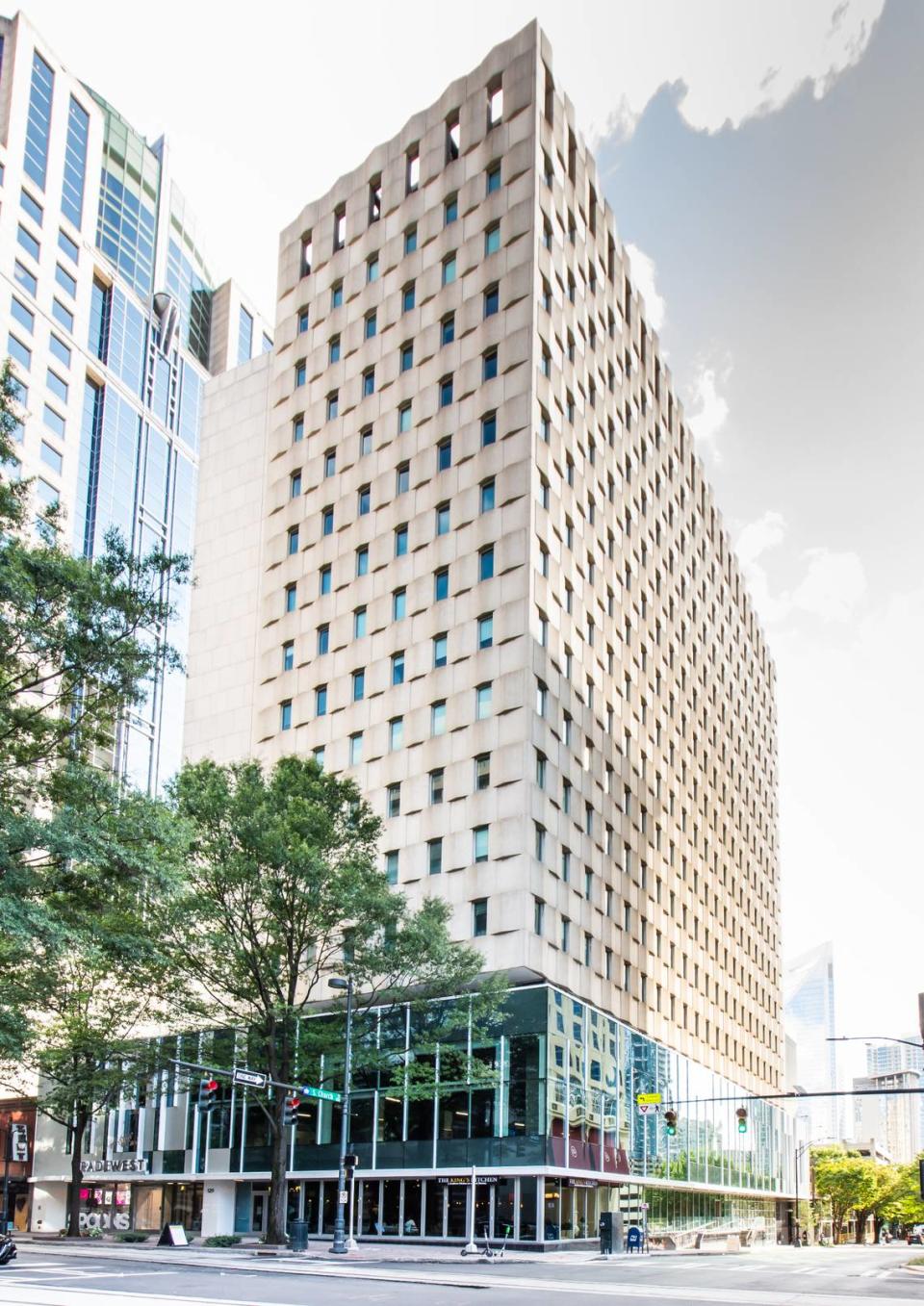 Trade West is a 15-story office building in uptown. Its new owner has invested $8.5 million into a new facade, elevators and entrance lobby. Leasing activity has picked up in the last year despite high vacancy rates in the city.