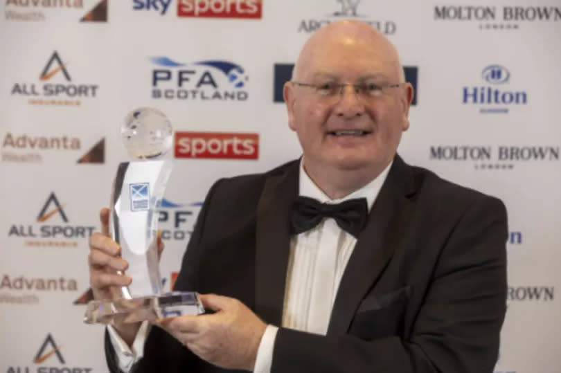 John McGlynn with the Manager of the Season Award -Credit:Photo by Jeff Holmes JSHPIX/REX/Shutterstock (14463898h)