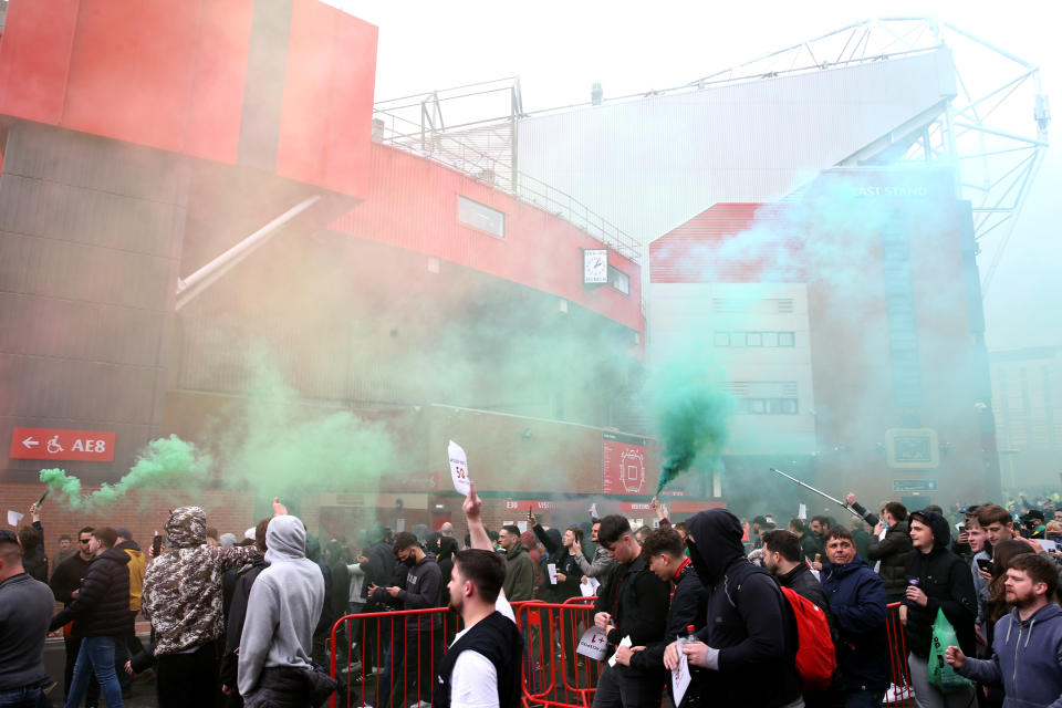 <p>Fans make their way into the ground as they protest against the Glazer family, the owners of Manchester United, before their Premier League match against Liverpool at Old Trafford, Manchester. Issue date: Sunday May 2, 2021.</p>
