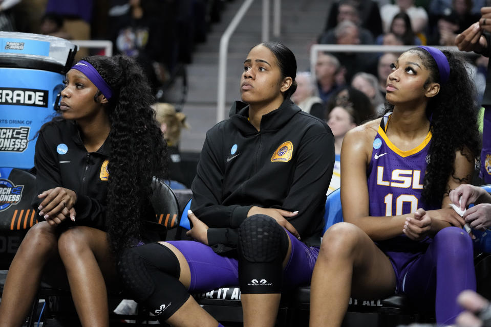 LSU players watch from the bench in the closing seconds of an Elite Eight round college basketball game against Iowa during the NCAA Tournament, Monday, April 1, 2024, in Albany, N.Y. (AP Photo/Mary Altaffer)